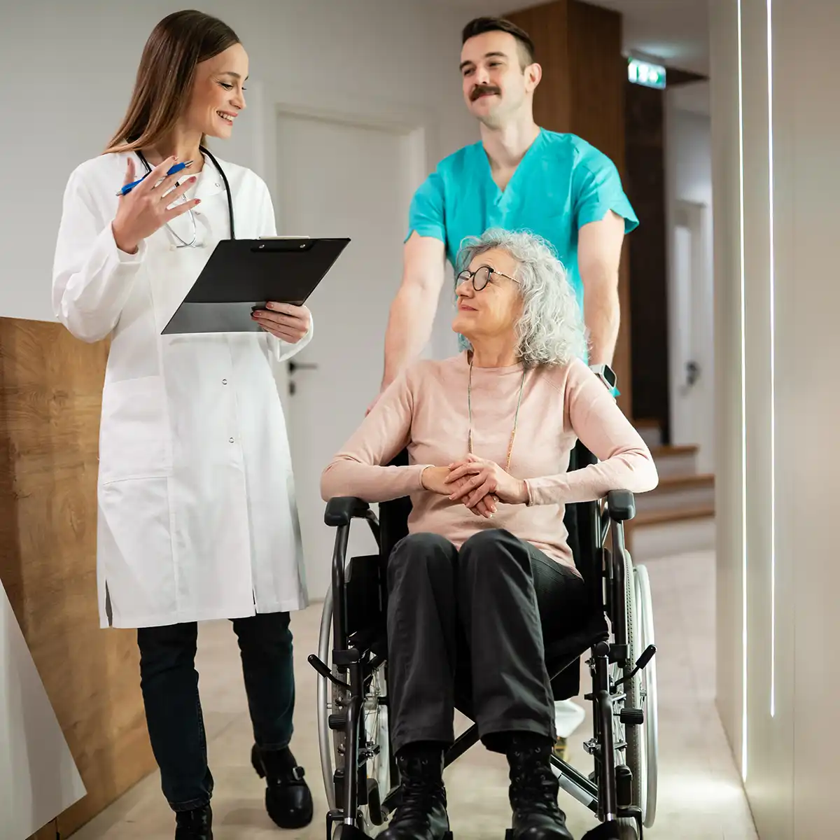 Legacy Assisted Living caregiver supporting a resident