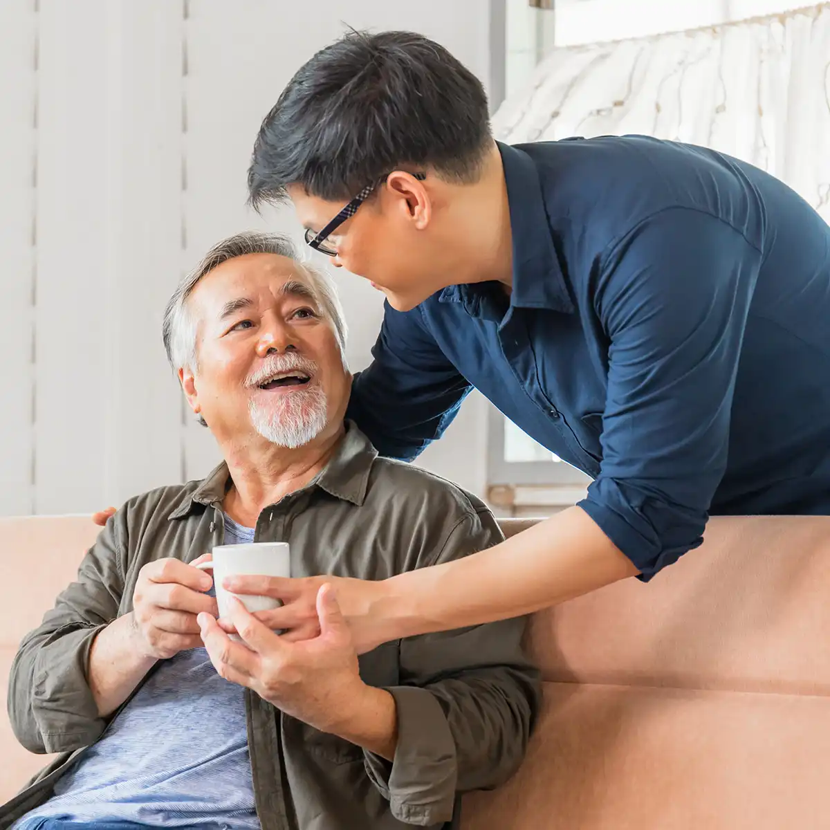 Family discussing assisted living pricing and care options